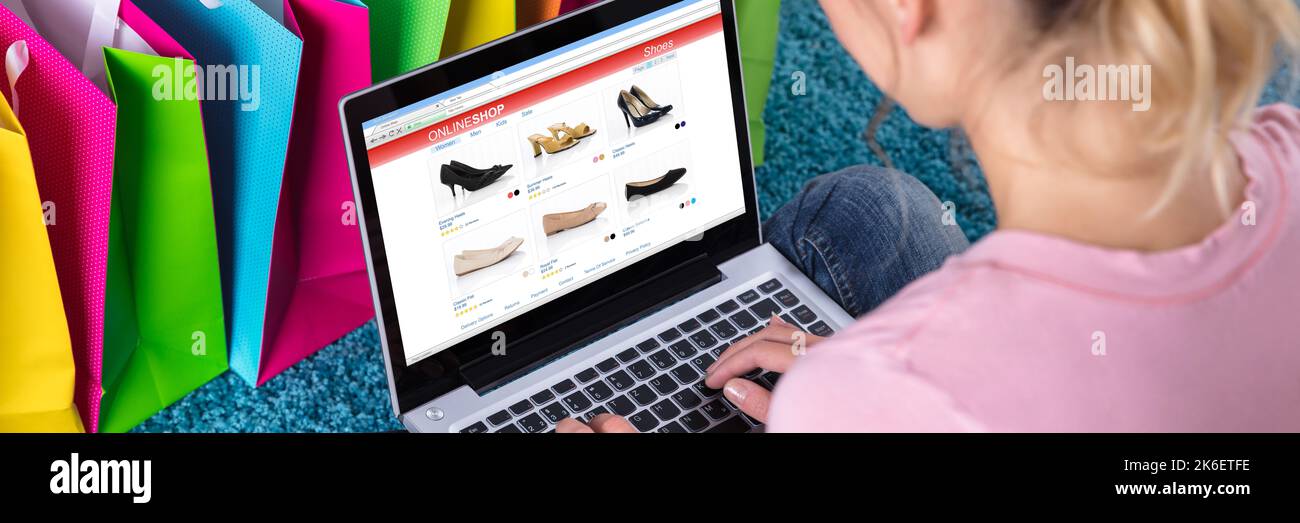 Online Ecommerce Shopping. Customer Woman At Home Stock Photo