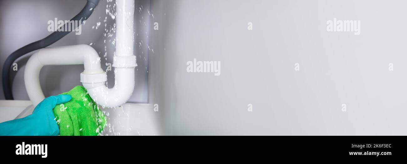 Water Pipe Damage And Home. Broken Kitchen Sink Stock Photo Alamy