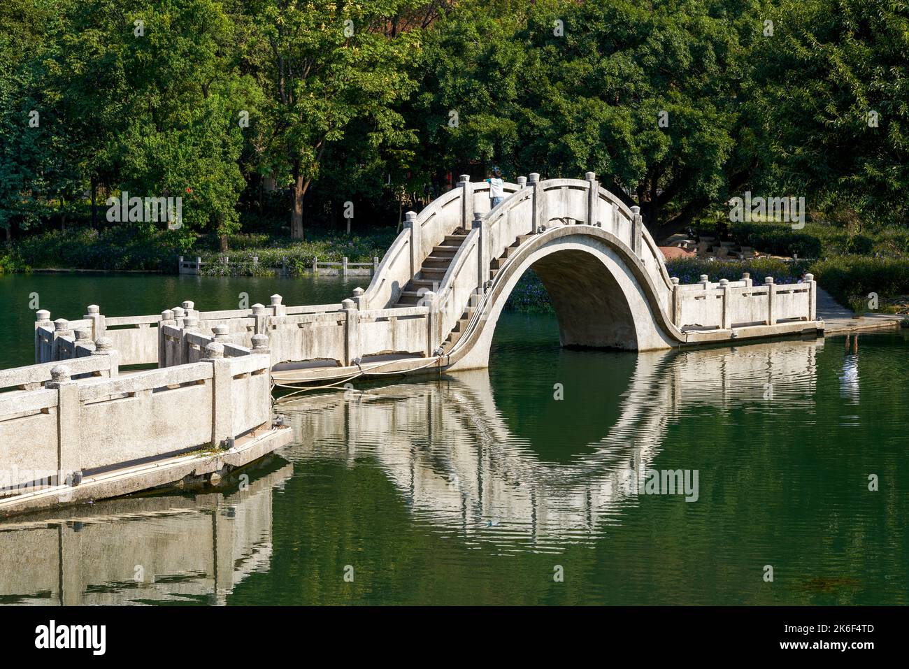 Bridge crossing lake sacred hi-res stock photography and images - Alamy