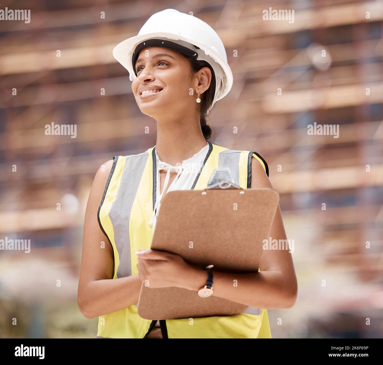 Logistics, shipping and business woman check containers for import, export and supply chain for global trade. Hard hat, female and use clipboard for Stock Photo