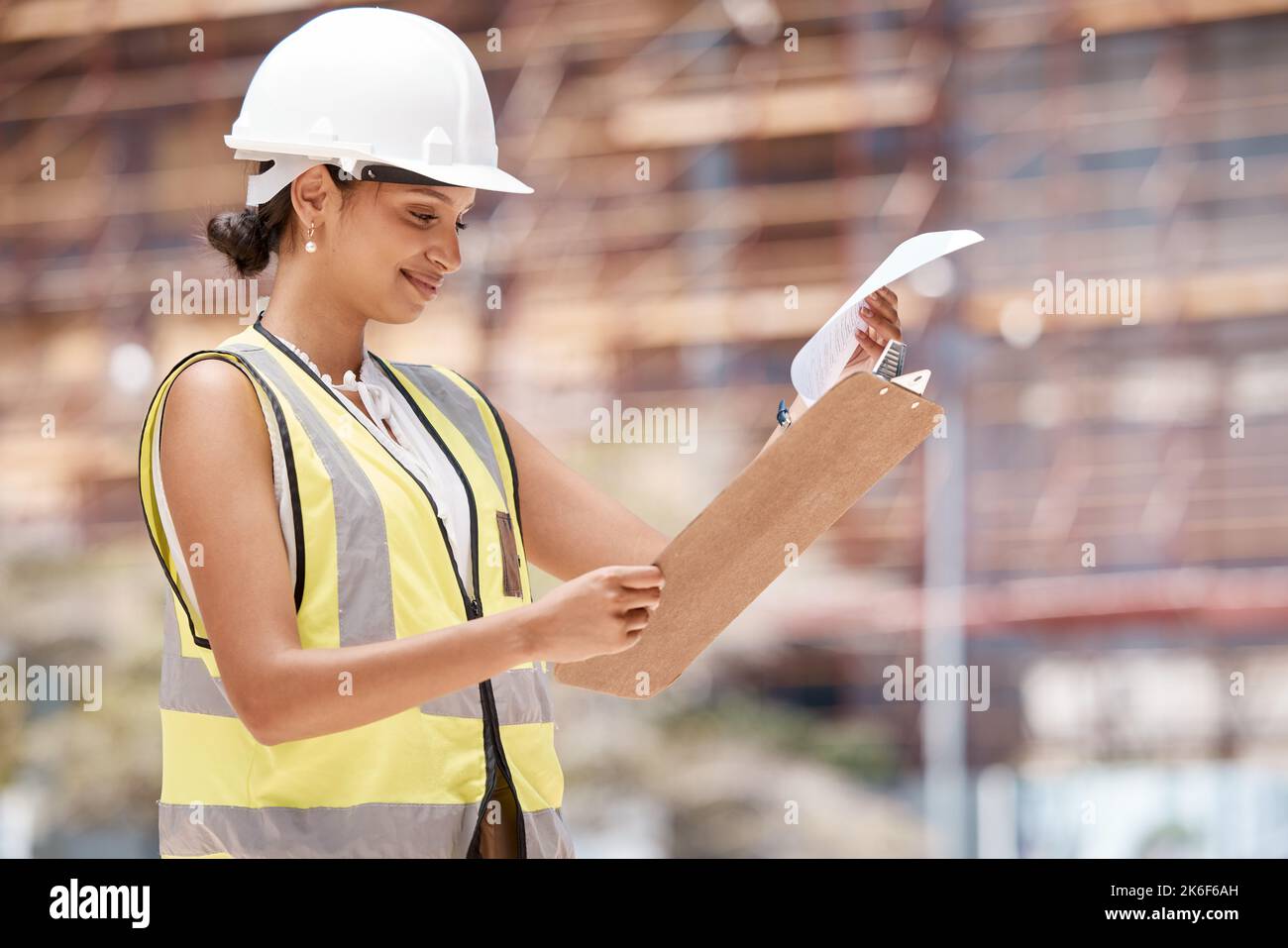 Construction worker, checklist and clipboard, woman and inspection