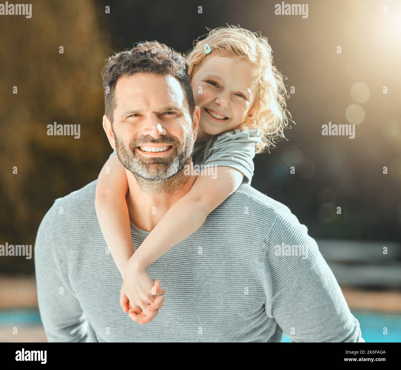 Fathering is not something perfect men do. a father spending time outdoors with his young daughter. Stock Photo