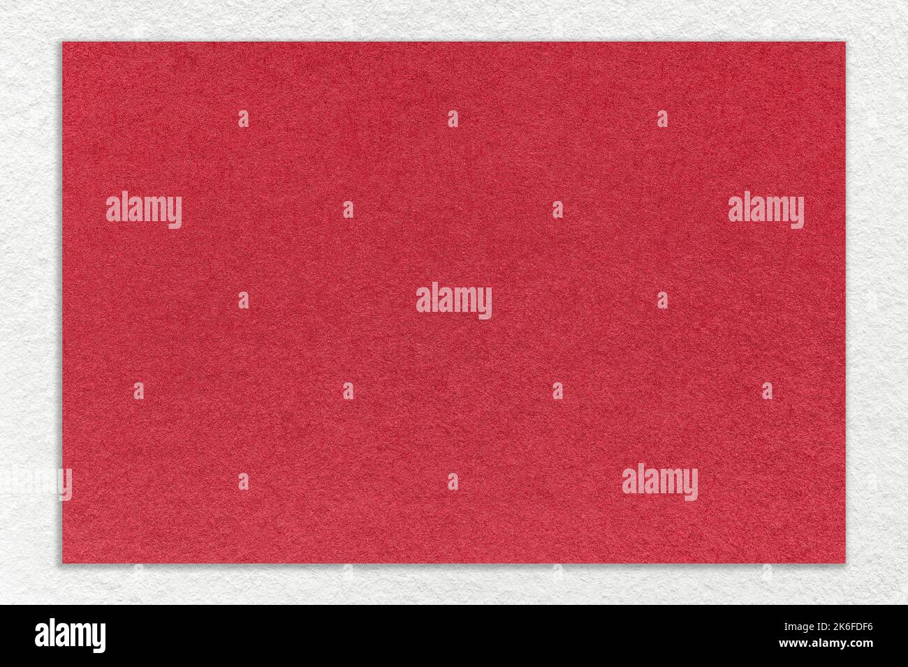 Texture of craft red color paper background with white border, macro ...