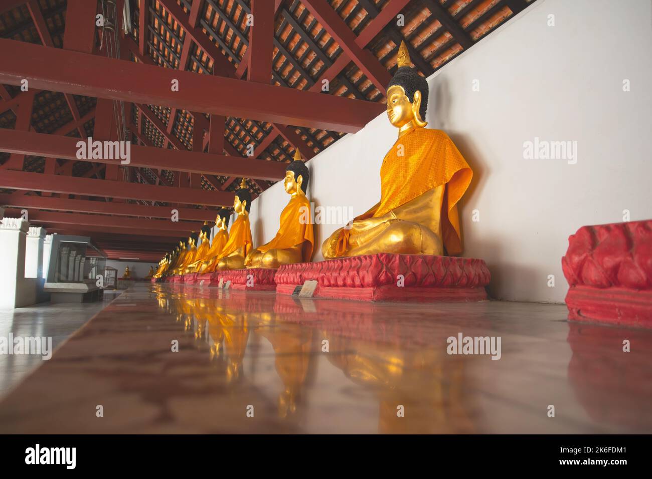 Buddha images are arranged in Wat Phra Mahathat Woramahawihan, Nakhon Si Thammarat, Thailand. Stock Photo