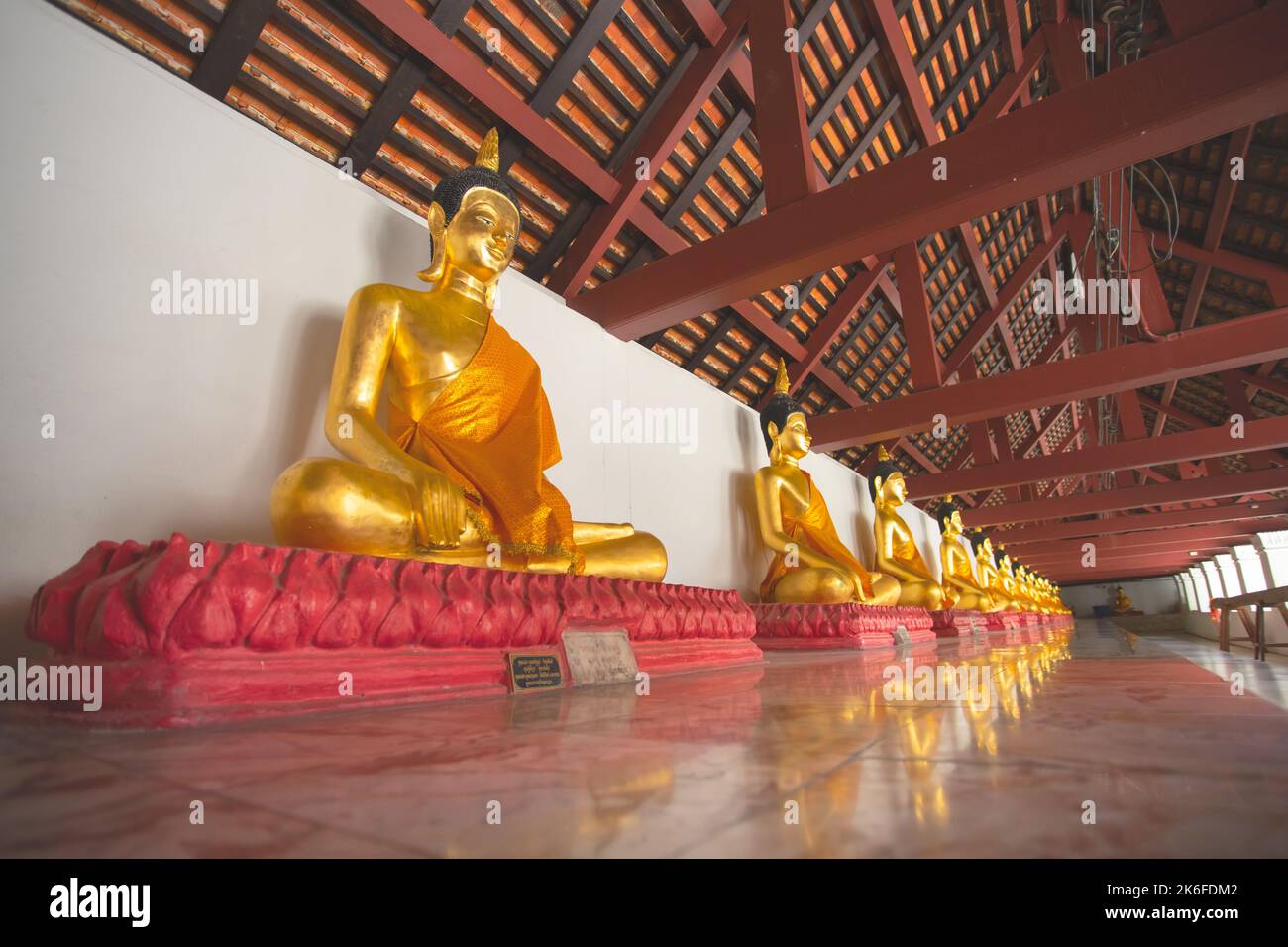 Buddha images are arranged in Wat Phra Mahathat Woramahawihan, Nakhon Si Thammarat, Thailand. Stock Photo