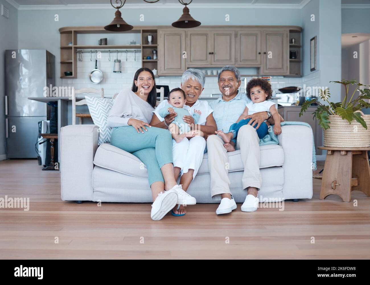 Always ahead of the rest. a beautiful family bonding on a sofa at home. Stock Photo