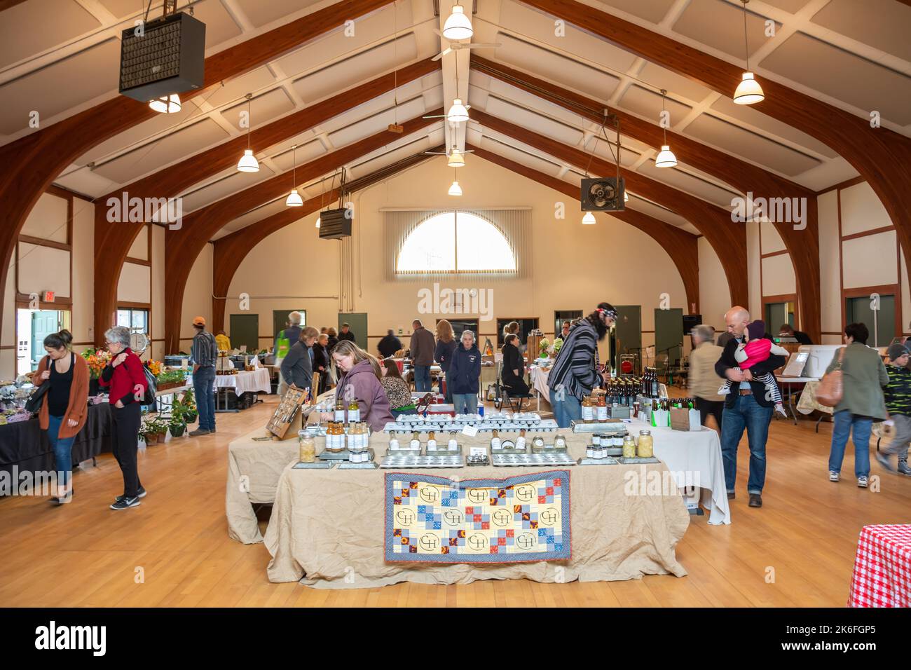 Callicoon, New York, United States of America – April 30, 2017. Sunday farmer market in Callicoon, NY. Interior view with people. Stock Photo