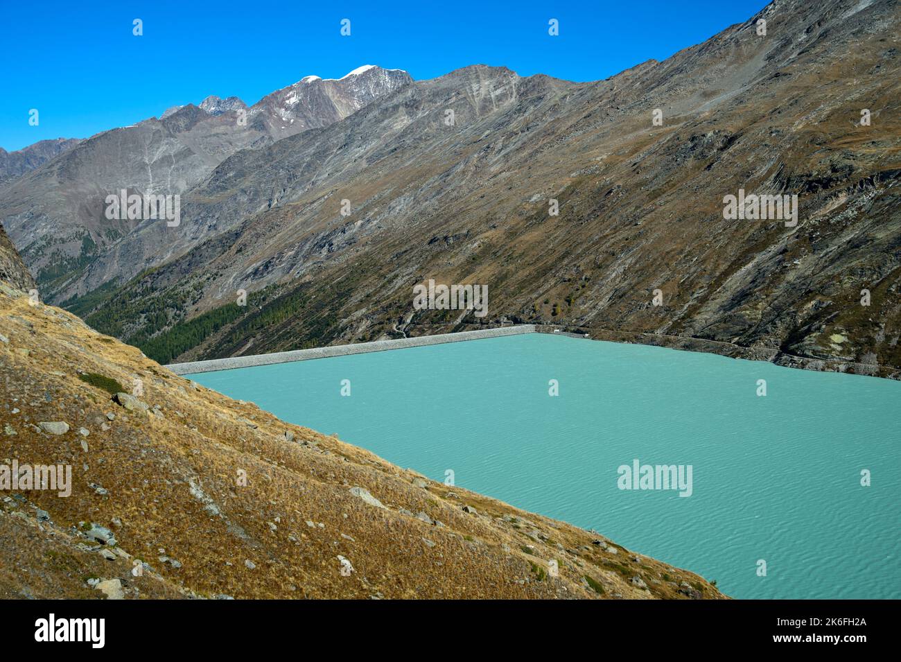 Mattmark reservoir with dam wall, Saas-Almagell, Valais, Switzerland Stock Photo
