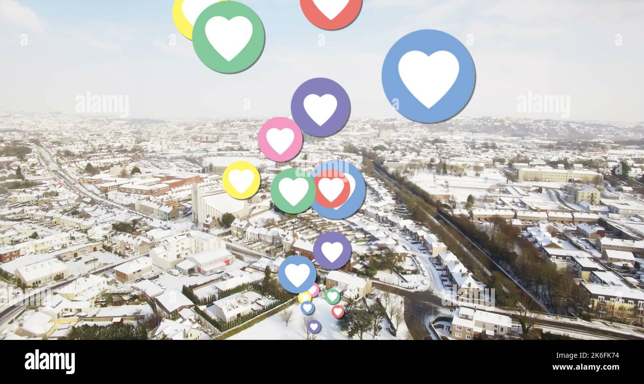 Image of social media hearts over cityscape. Social media ...