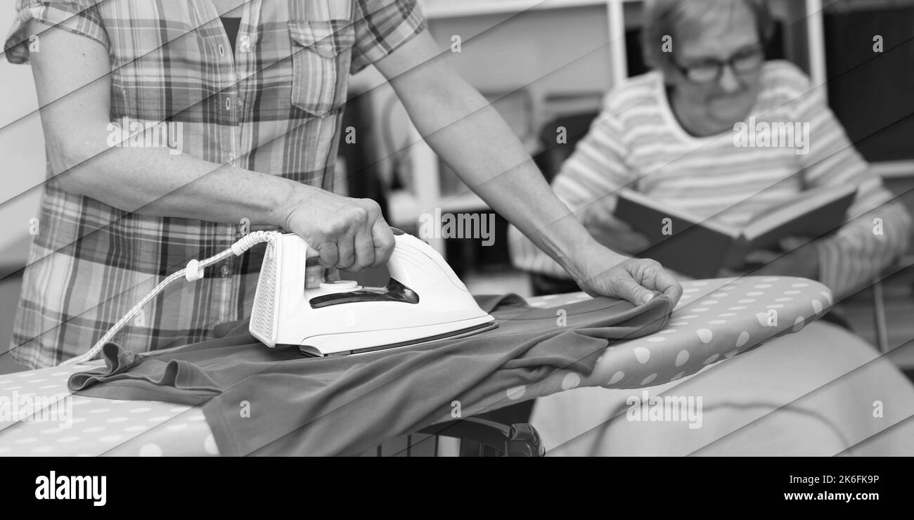 Ironing clothes Black and White Stock Photos & Images Alamy