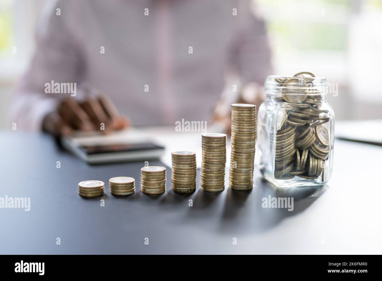 Pension Fund Jar. Coins And Inflation. Money Deposit Stock Photo