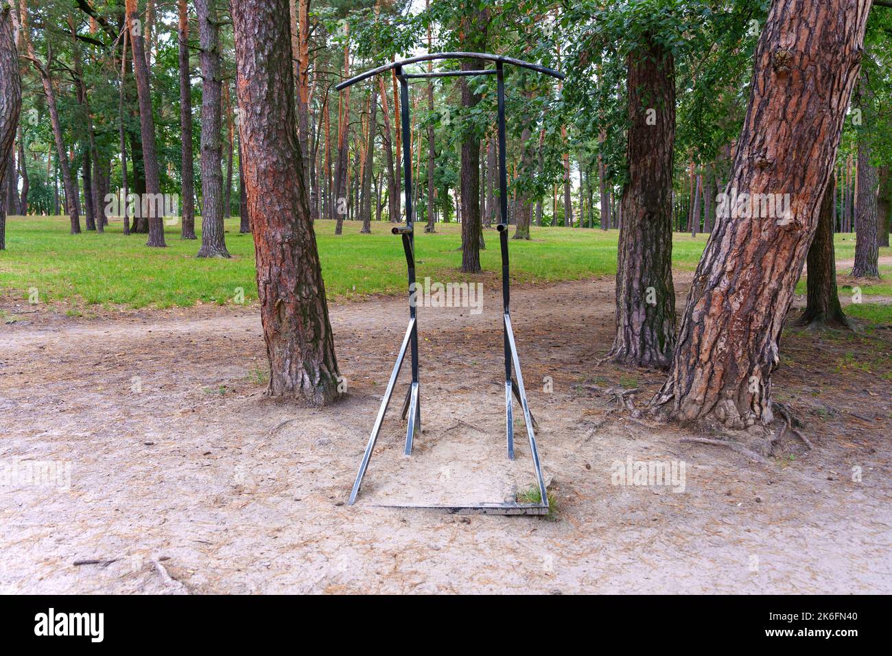 Free standing pull-up bar and dips station in the local park Stock