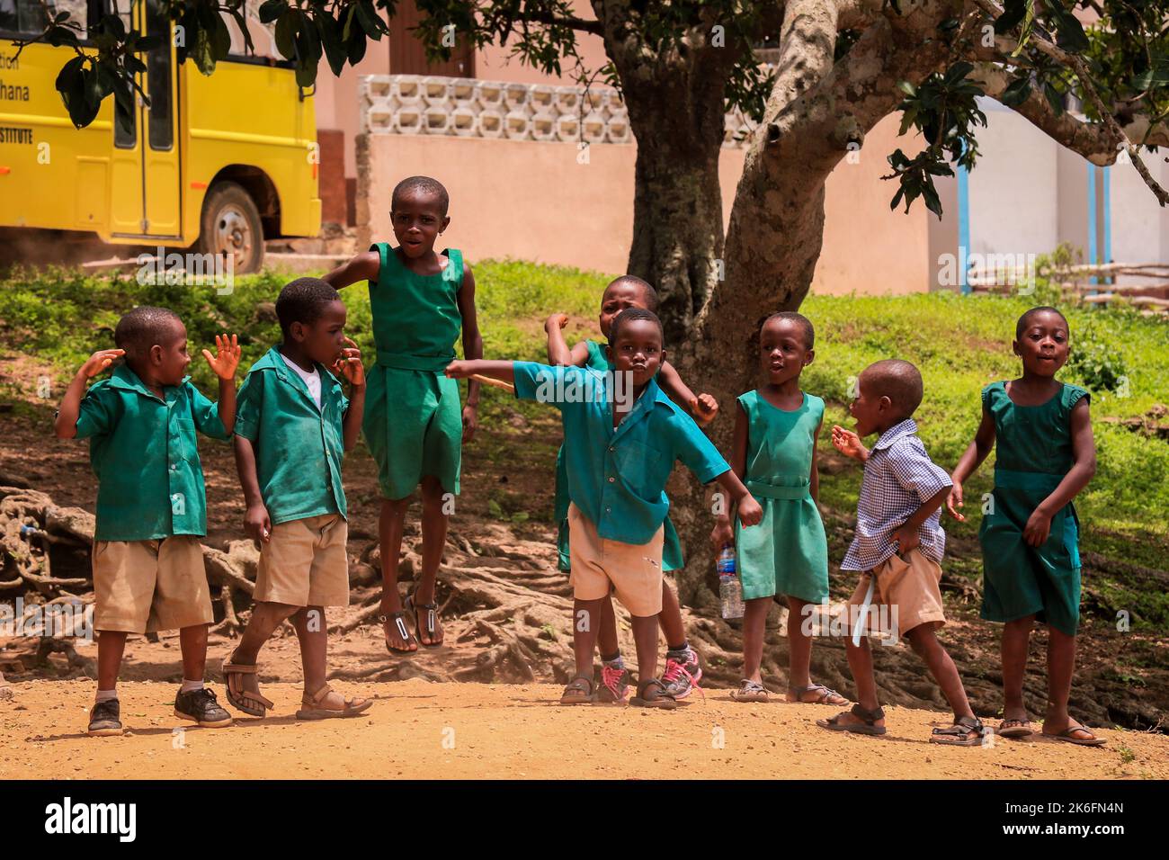 Amedzofe, Ghana - April 07, 2022: African Pupils in Colorful School Uniform near the small Ghana Amedzofe town Stock Photo