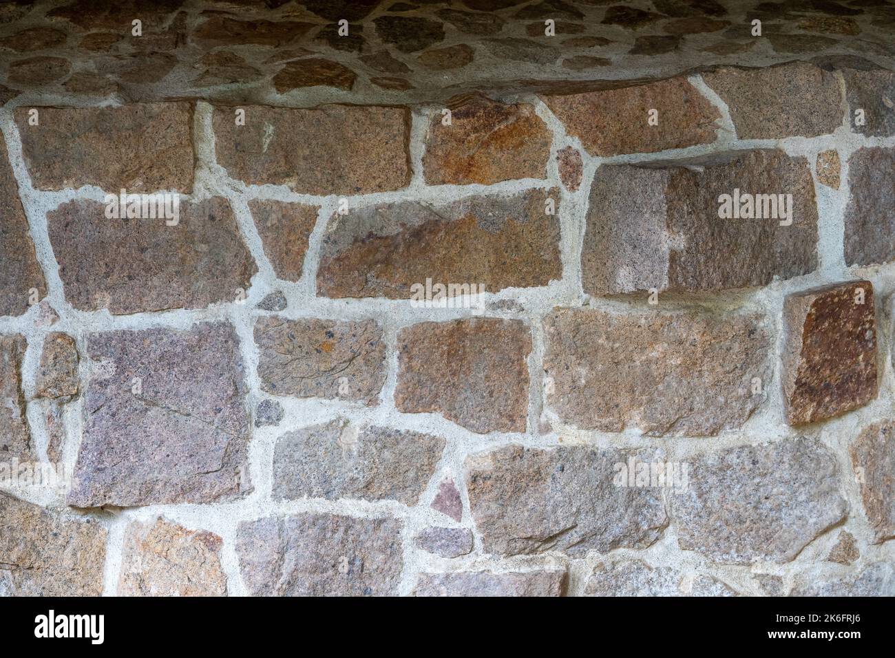 Natural stone wall background texture Stock Photo