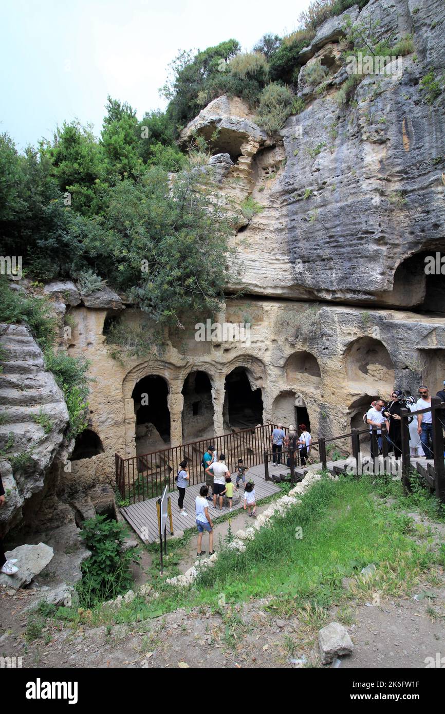 Besikli Cave is located in the Samandag district of Hatay. Cave BC. It was made in the 1st century. Titus Tunnel is also located near the cave. Stock Photo