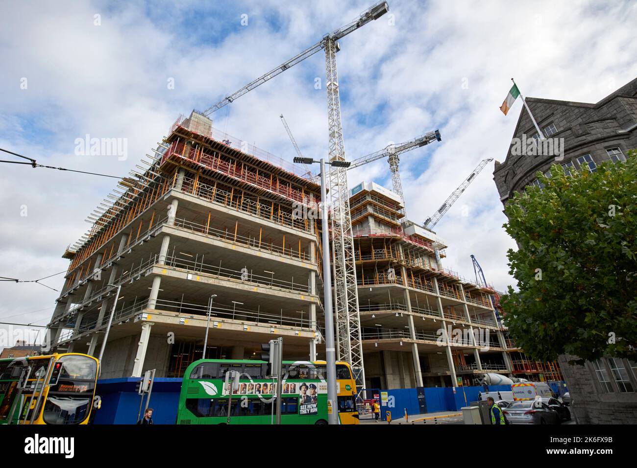 cranes and skeleton building under construction on the college square site townsend st dublin republic of ireland Stock Photo
