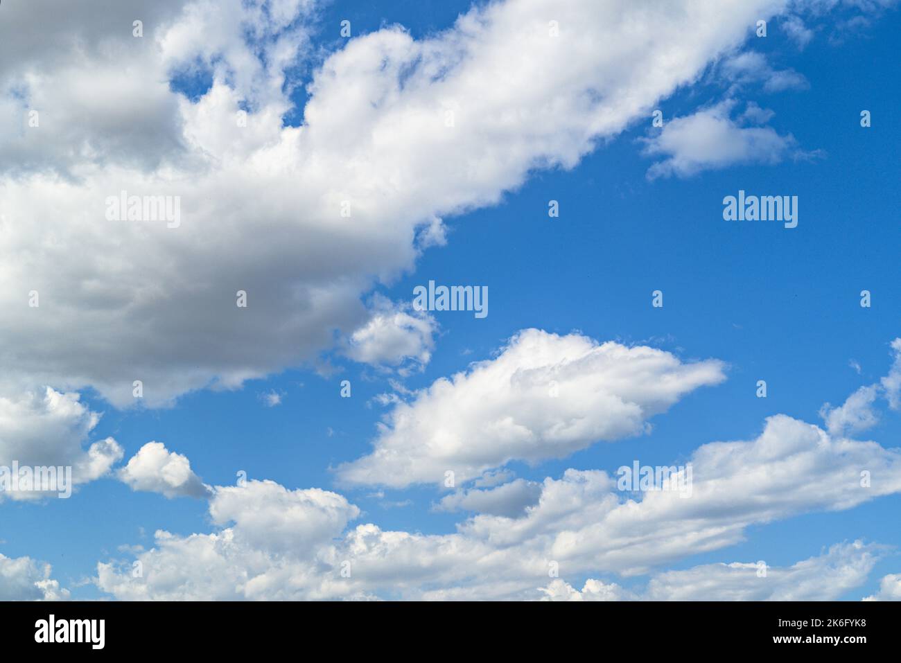 White clouds in a bright blue sky. The beauty of the nature Stock Photo ...