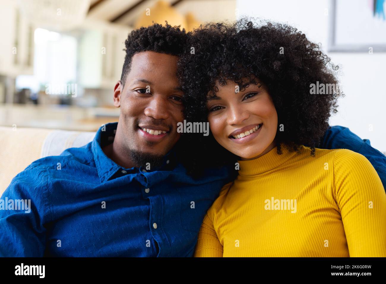 Portrait of happy african american couple embracing and smiling Stock ...