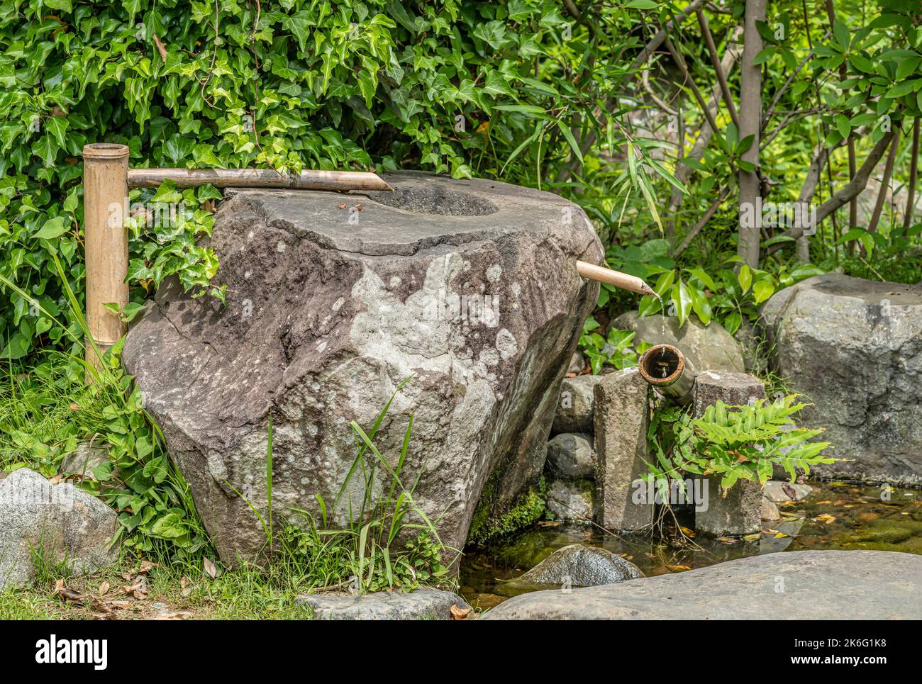 Ancient bamboo water pipe at a Japanese Garden in Kamakura, Japan Stock