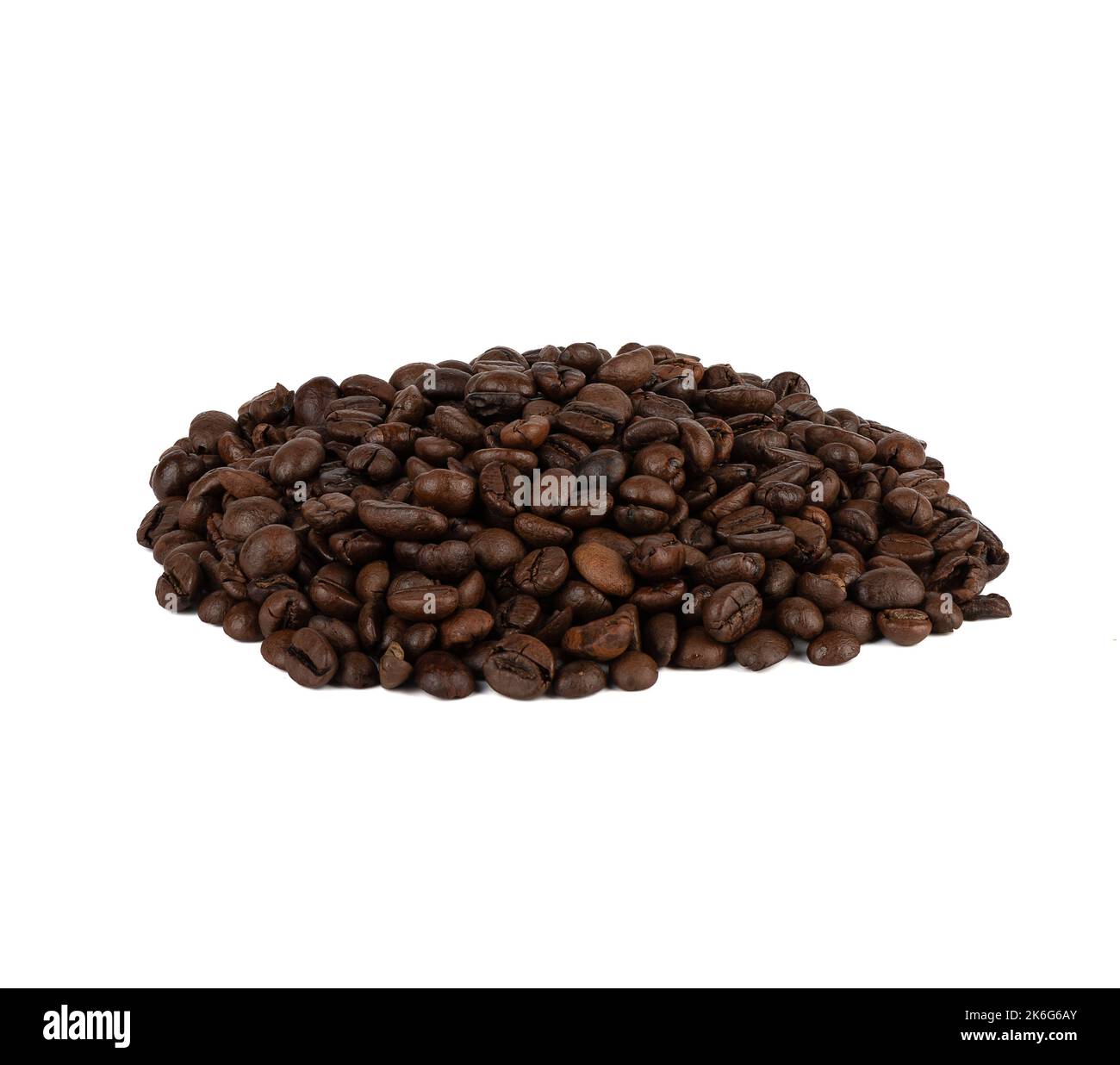 Mixture of roasted Arabica and Robusta coffee beans on a white ...