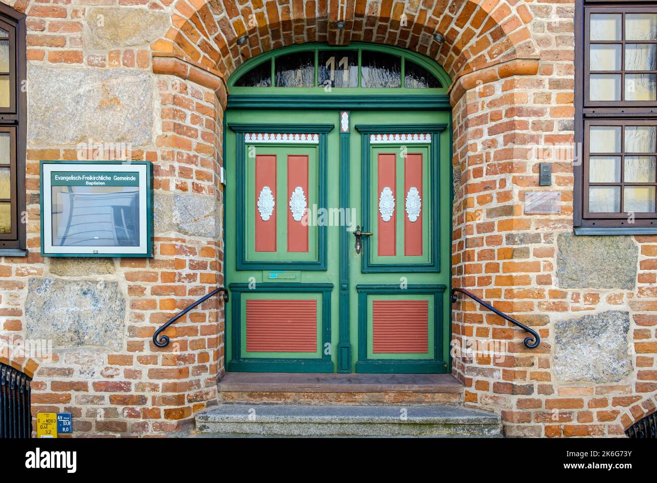 Vintage door richly decorated with ornamentation and carvings of the listed building of Fährstraße no. 11, Stralsund, Germany. Stock Photo