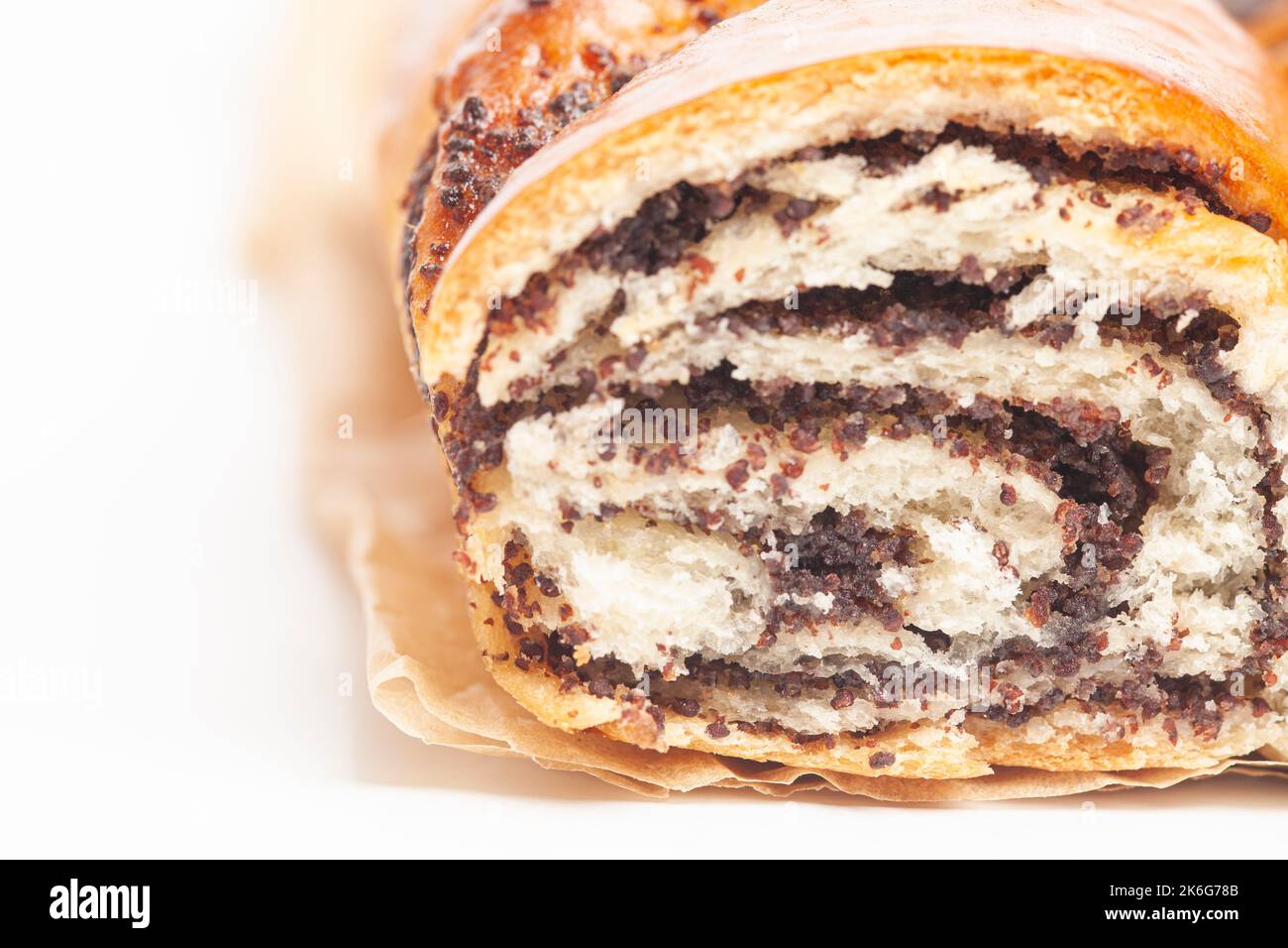 poppy seed strudel isolated on white Stock Photo Alamy