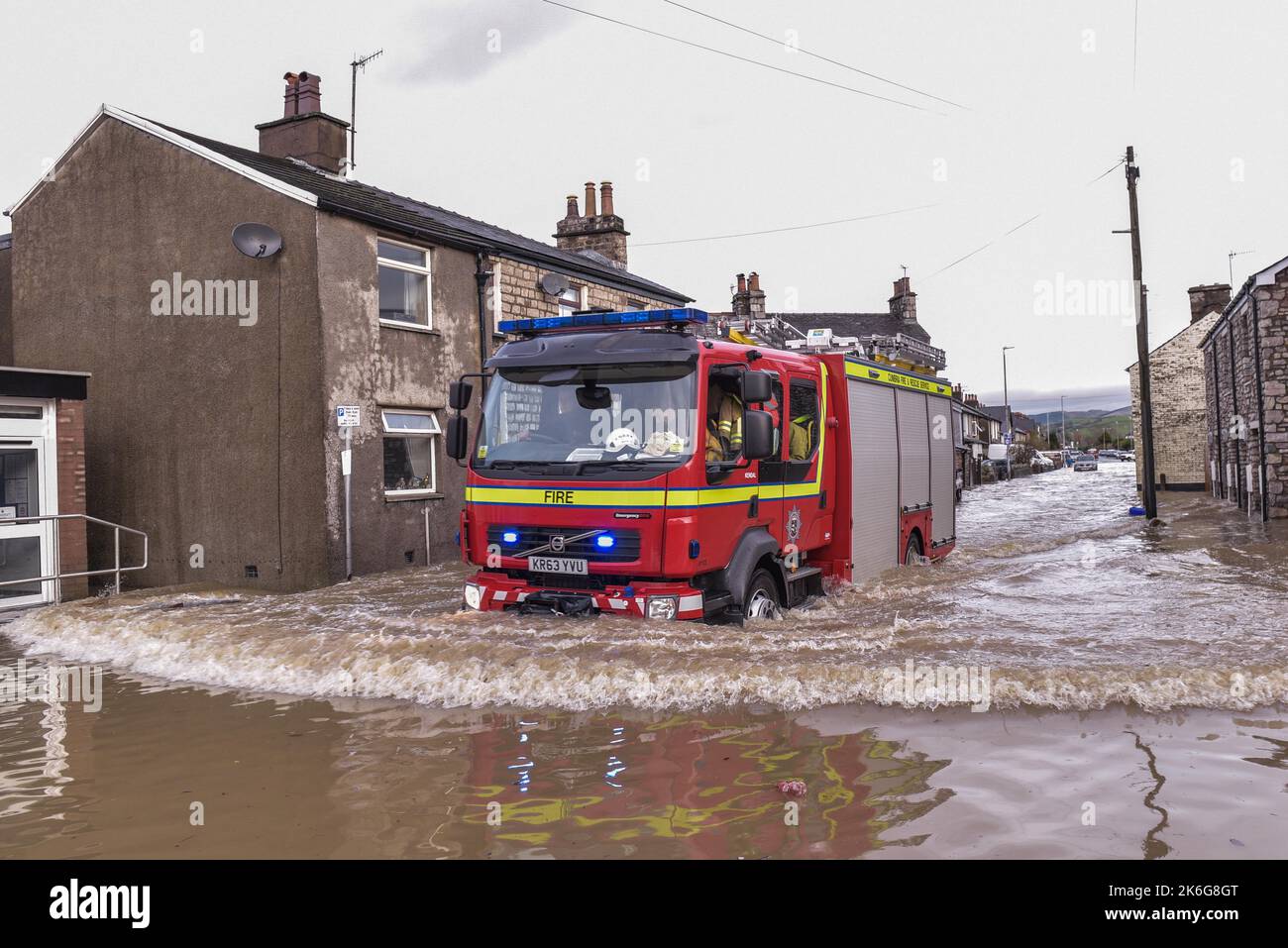 Kendal, Cumbria - December 6th 2015 - A fire engine battles through major flooding in Kendal, Cumbria on the 6th of December 2015 after Storm Desmond. Pic Credit: Scott CM/Alamy Live News Stock Photo