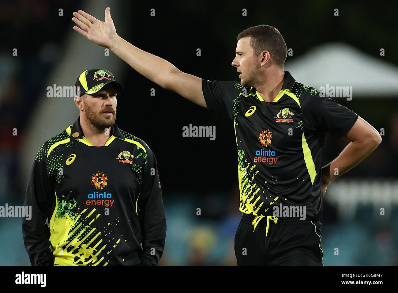 Canberra, Australia. 14th Oct, 2022. Aaron Finch of Australia and Josh Hazlewood of Australia during the Dettol T20I Series 3 of 3 Australia vs England at Manuka Oval, Canberra, Australia, 14th October 2022 (Photo by Patrick Hoelscher/News Images) in Canberra, Australia on 10/14/2022. (Photo by Patrick Hoelscher/News Images/Sipa USA) Credit: Sipa USA/Alamy Live News Stock Photo