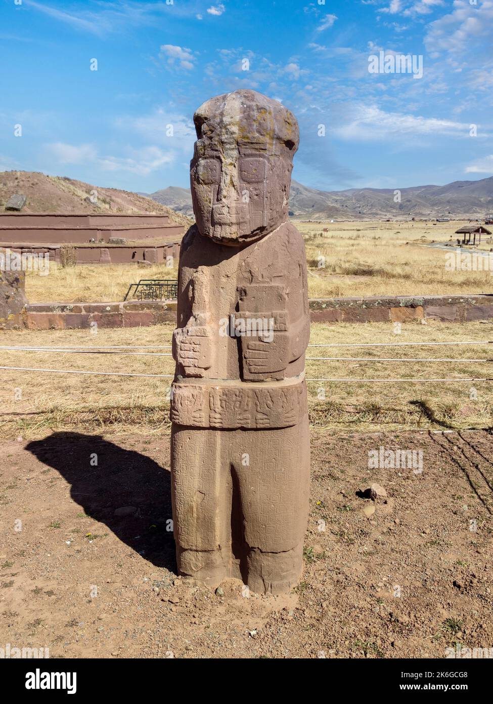 Monolith Fraile, an ancient artifact carved in sandstone grain of 3 m. tall, in Tiwanaku or Tiahuanaco pre-columbian Archaeological site, in Bolivia. Stock Photo