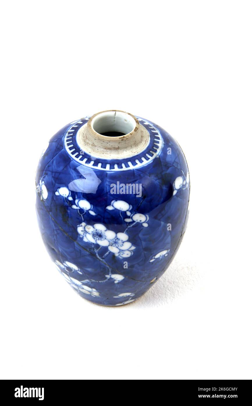 Vintage Chinese Blue and White Prunus Blossom Vase Broken and Glued together Stock Photo