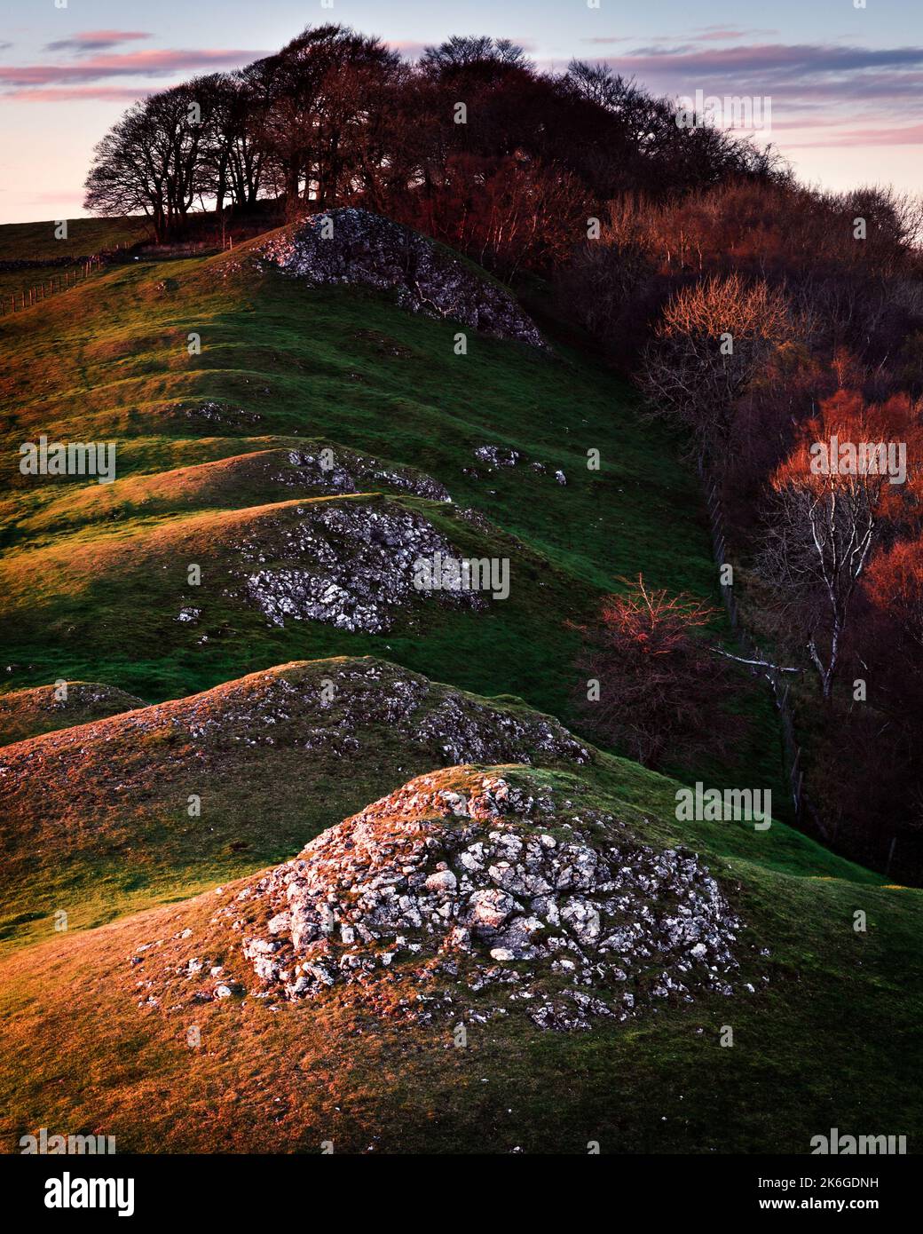 A sunset light on the colorful Bunster Hill, Dovedale in the Peak District national park, UK Stock Photo