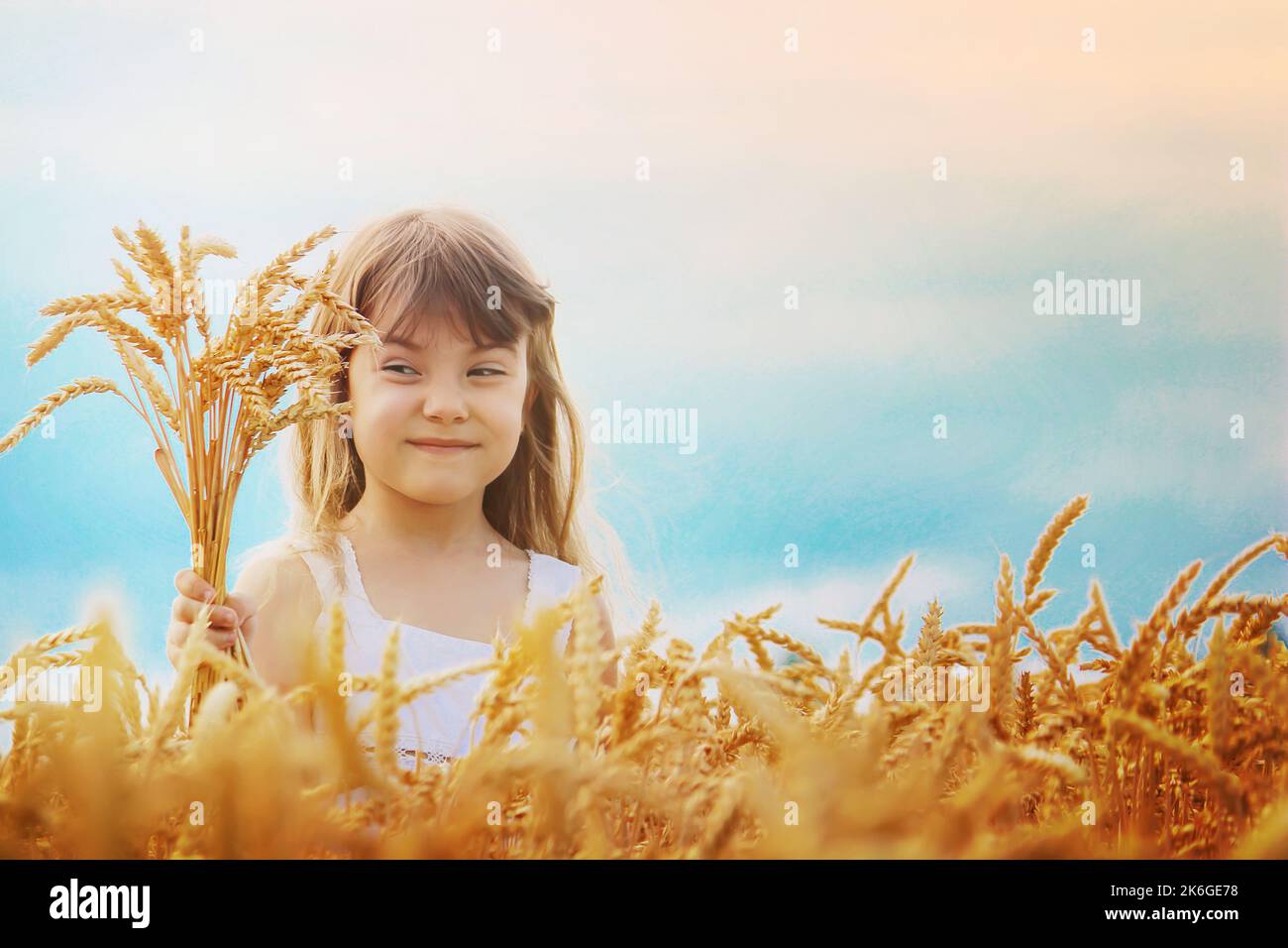 child in a wheat field. selective focus. nature Stock Photo - Alamy