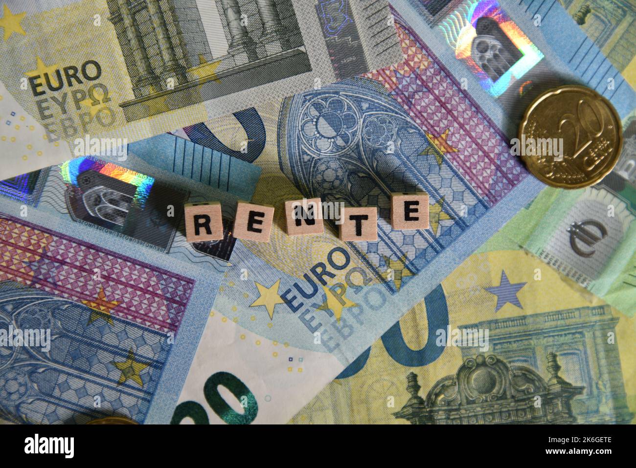 the german word for pension with wodden cubes and euro bills Stock Photo