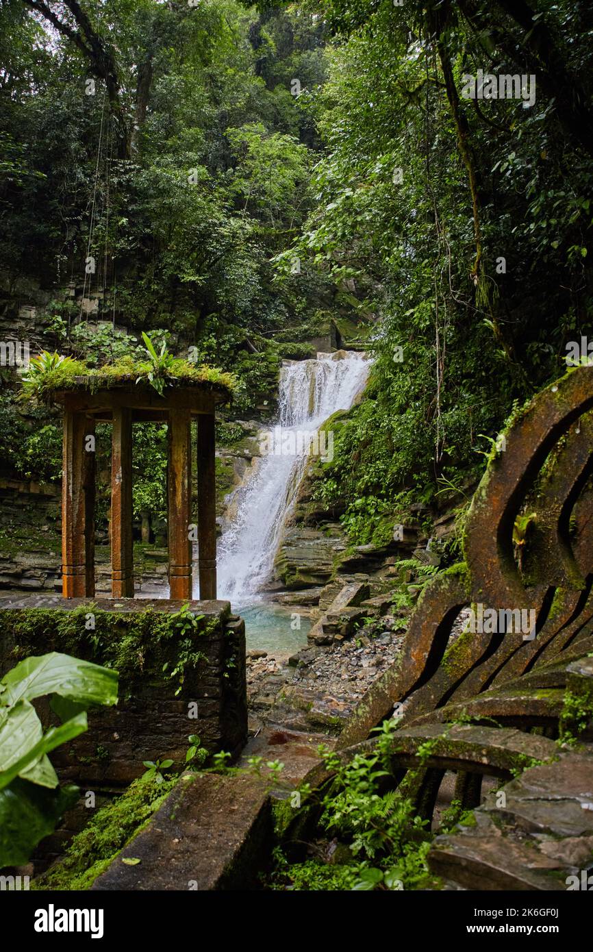The beautiful Las Pozas sculptures with a waterfall in the background in the Surrealist Sculpture Garden Stock Photo
