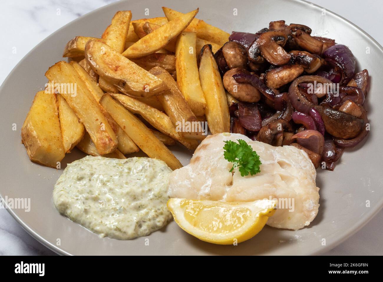 Baked cod loin, skin on chips, sauteed mushroom and red onion, tartare