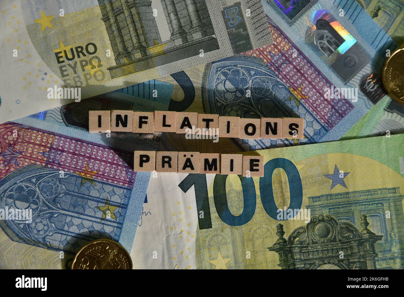 the german word for a social payment of the state with wodden cubes and euro bills Stock Photo