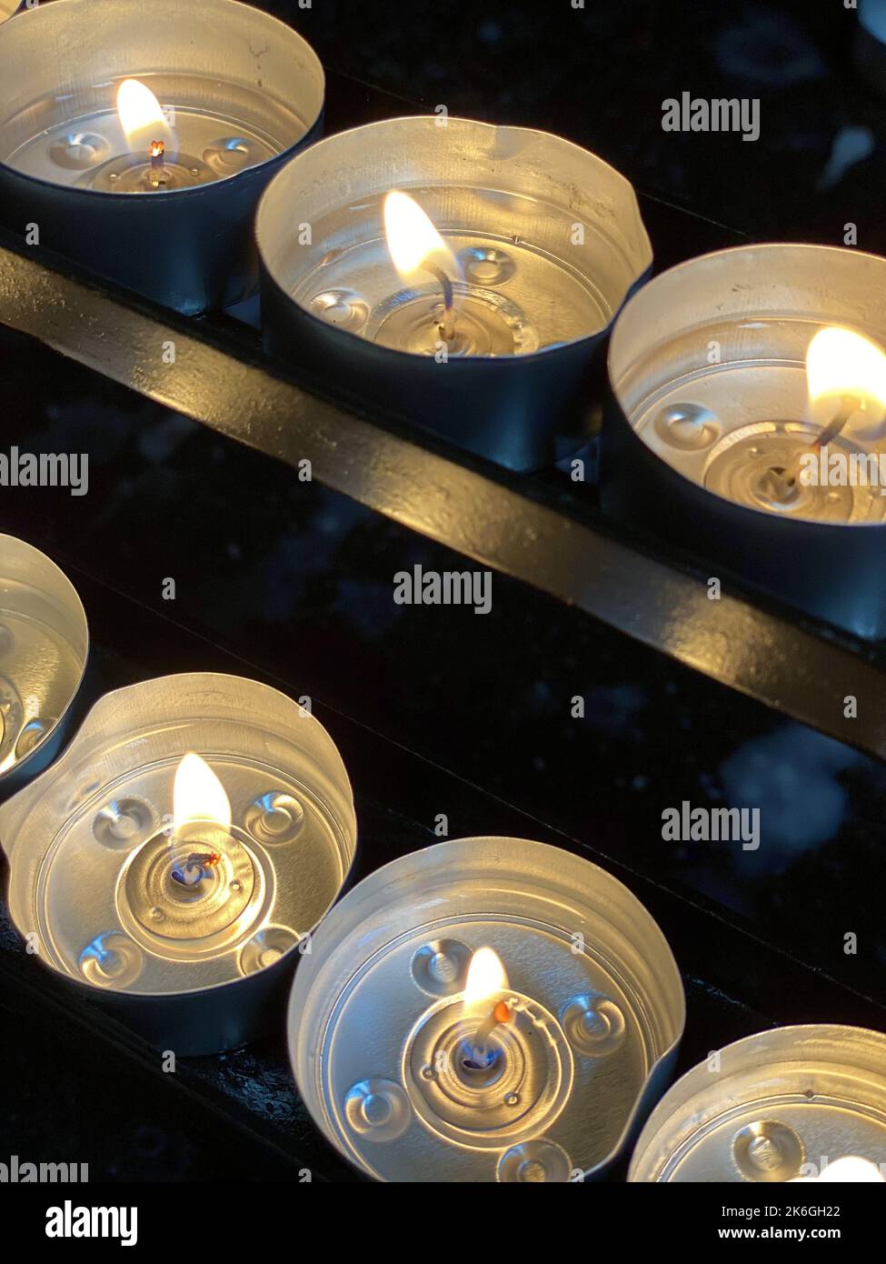 Burning Tea Lights In A Church Stock Photo Alamy