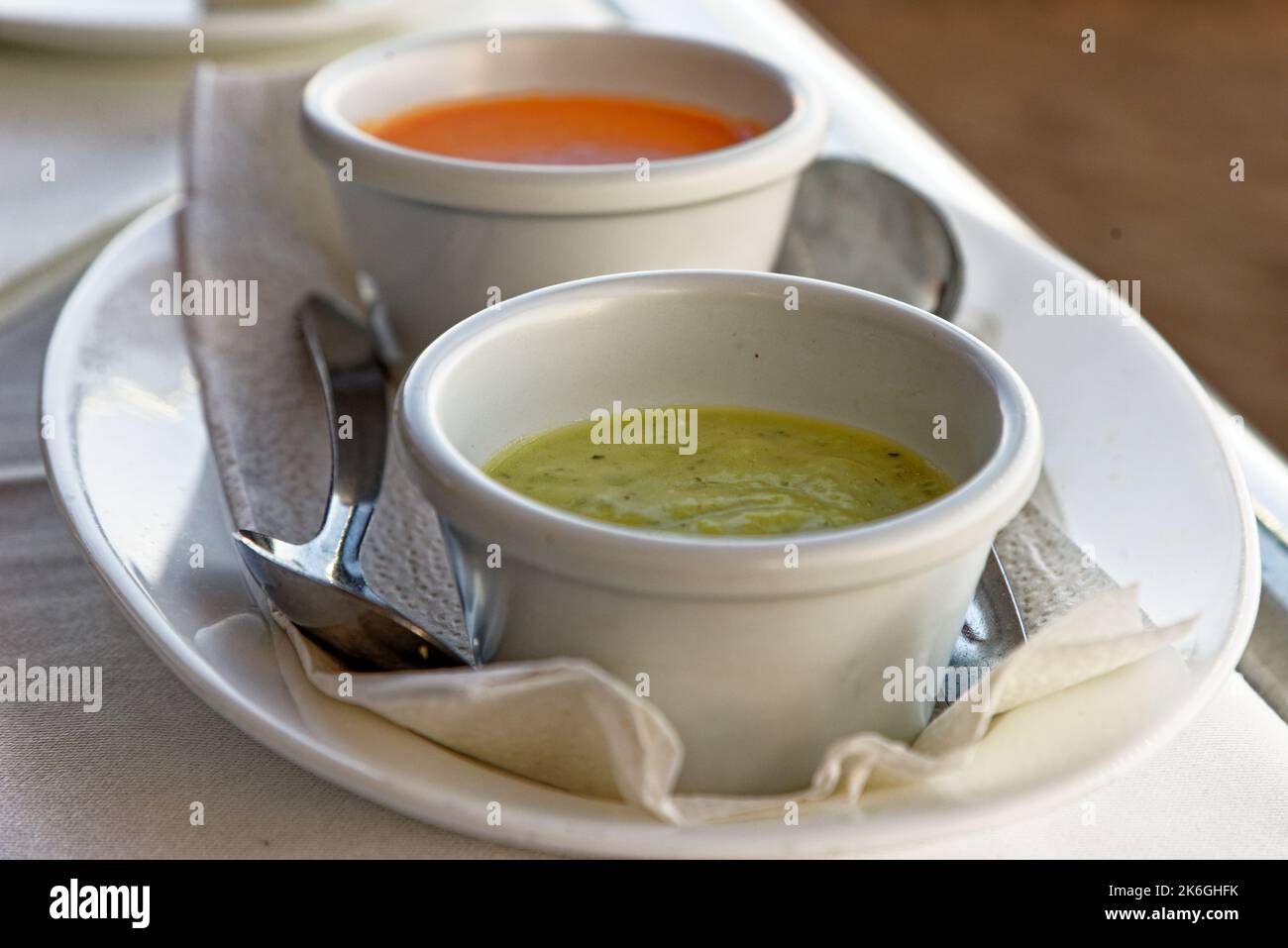 Traditional Spanish food mojo rojo and mojo verde - Typical red and green mojo dips to accompany food in Tenerife, Canary Islands, Spain Stock Photo