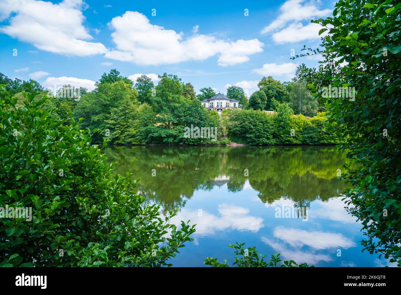 Germany, Stuttgart city park baerensee house lake water reflecting ...