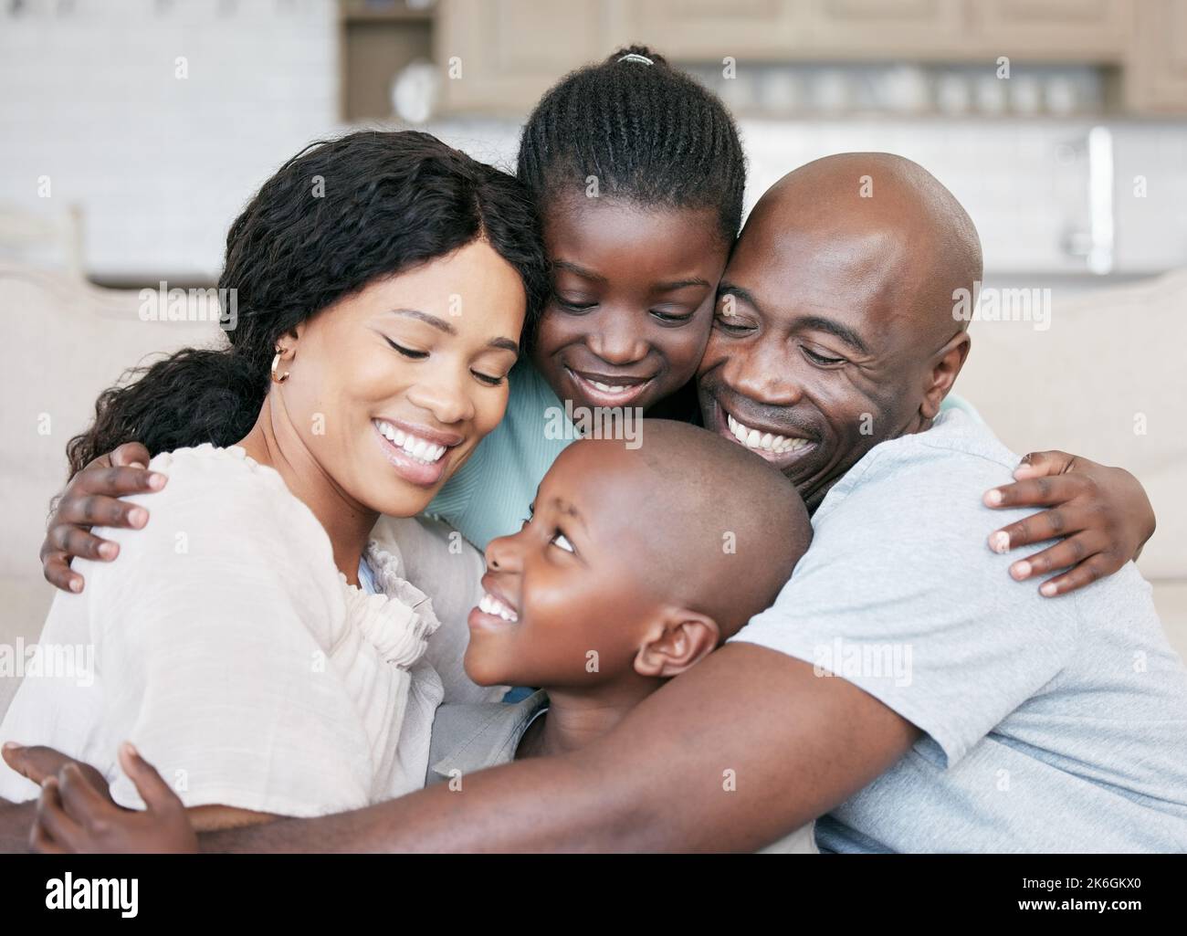 The most important thing in the world is family. a young family happily bonding together on the