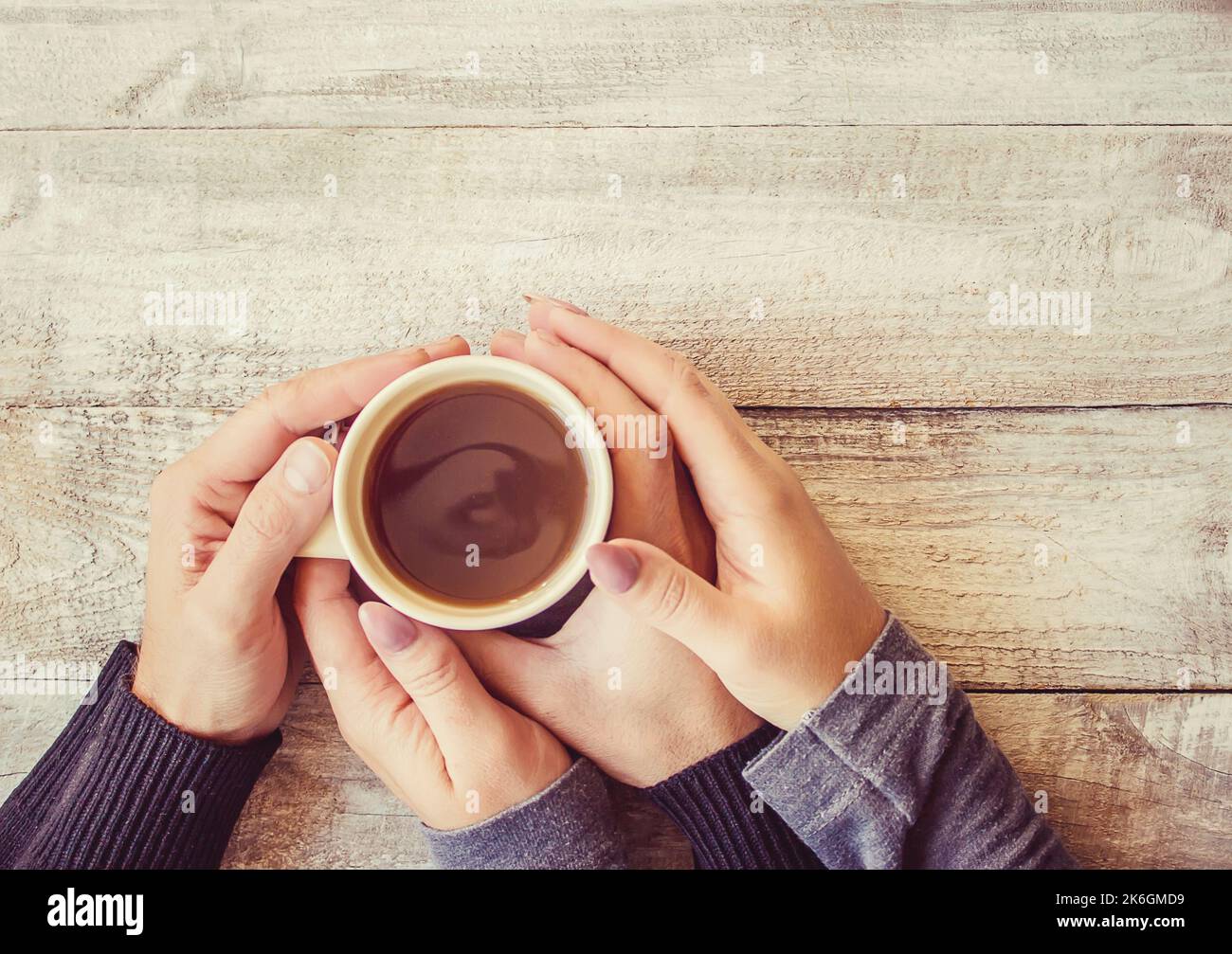 Tea in hand. The lovers are together. Selective focus. Drink Stock ...
