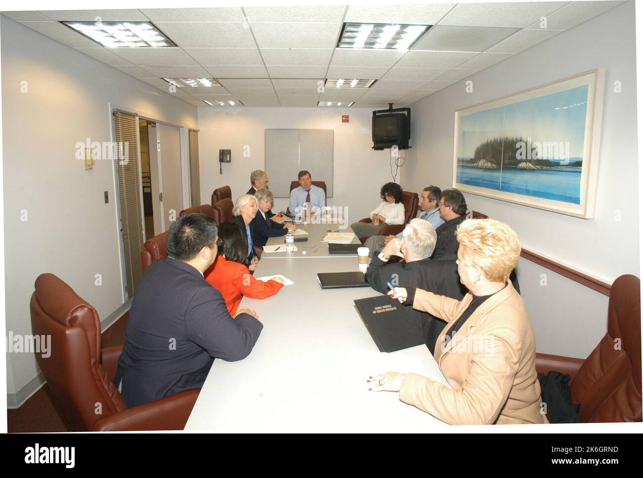 Views of Bureau of Administration staff in assorted work settings, for ...