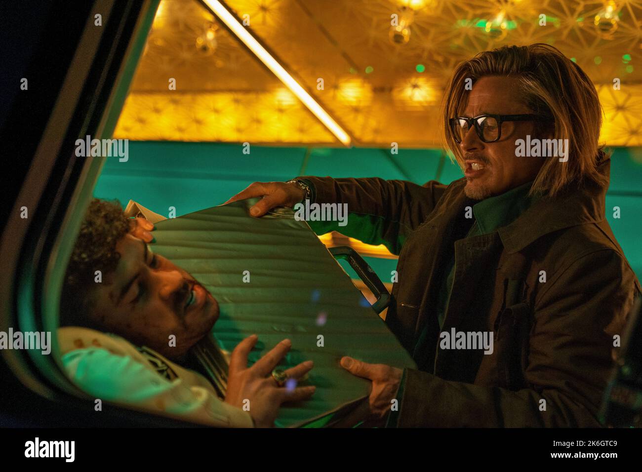 Bullet Train: starring Brad Pitt as Ladybug Stock Photo