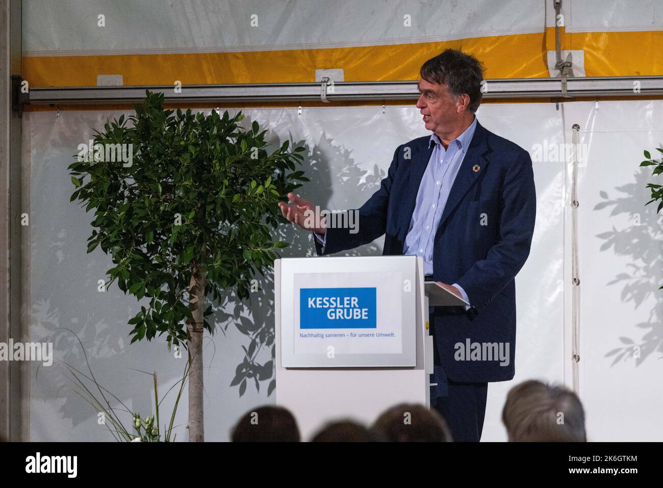 Grenzach Wyhlen, Germany. 14th Oct, 2022. André Hoffmann, Vice Chairman of the Board of Roche Holding AG and great-grandson of company founder Fritz Hoffmann-La Roche, speaks during an event on the remediation of the Kesslergrube. For more than two decades, the so-called Kesslergrube served as a landfill for Grenzach-Wyhlen. The pharmaceutical company Roche also left waste here. Ten years after it began, Roche is now celebrating the completion of the extensive remediation work. Credit: Philipp von Ditfurth/dpa/Alamy Live News Stock Photo