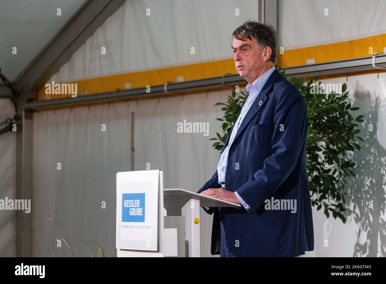 Grenzach Wyhlen, Germany. 14th Oct, 2022. André Hoffmann, Vice Chairman of the Board of Roche Holding AG and great-grandson of company founder Fritz Hoffmann-La Roche, speaks during an event on the remediation of the Kesslergrube. For more than two decades, the so-called Kesslergrube served as a landfill for Grenzach-Wyhlen. The pharmaceutical company Roche also left waste here. Ten years after it began, Roche is now celebrating the completion of the extensive remediation work. Credit: Philipp von Ditfurth/dpa/Alamy Live News Stock Photo