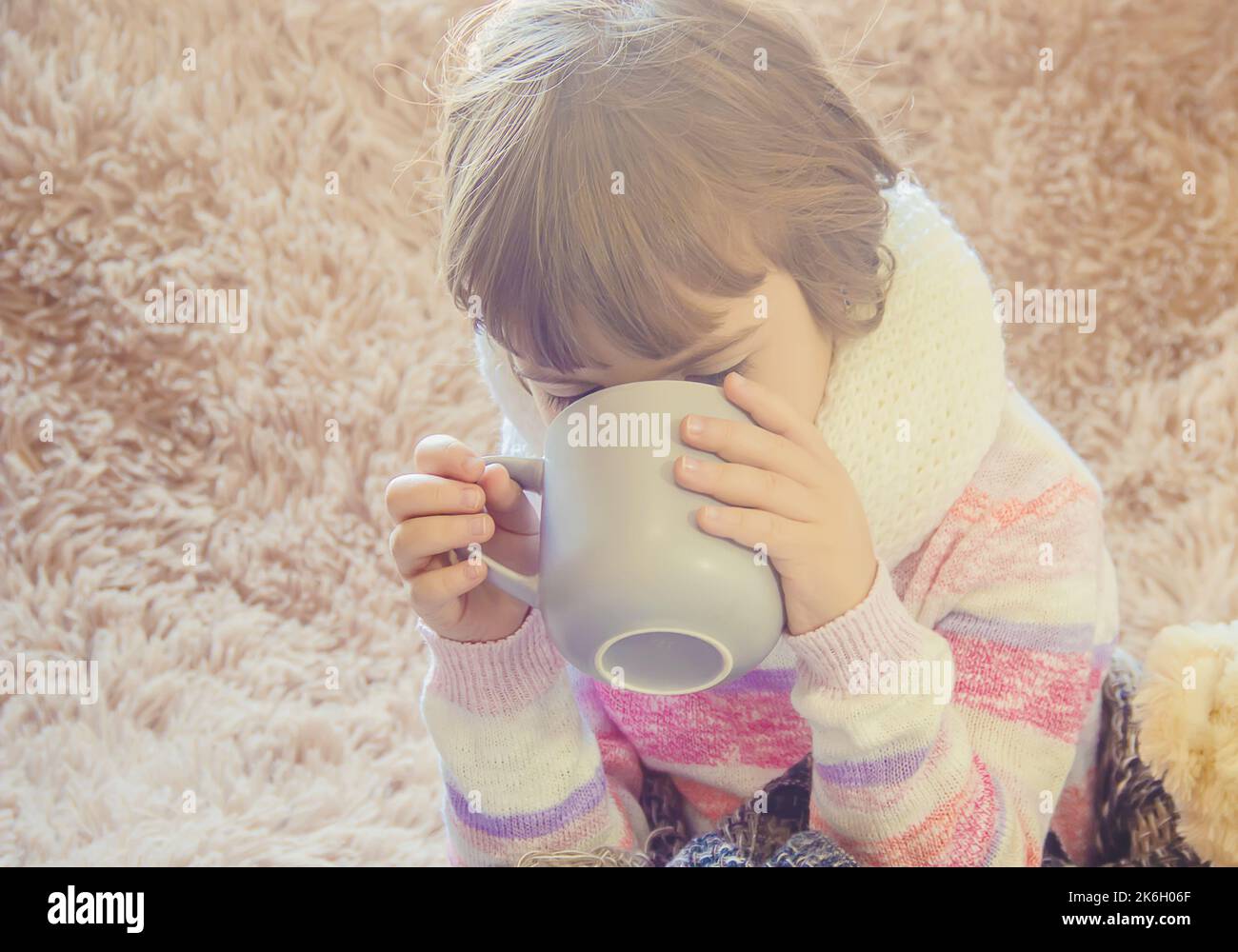 Cold at the child. Runny nose. Selective focus. Kids Stock Photo Alamy