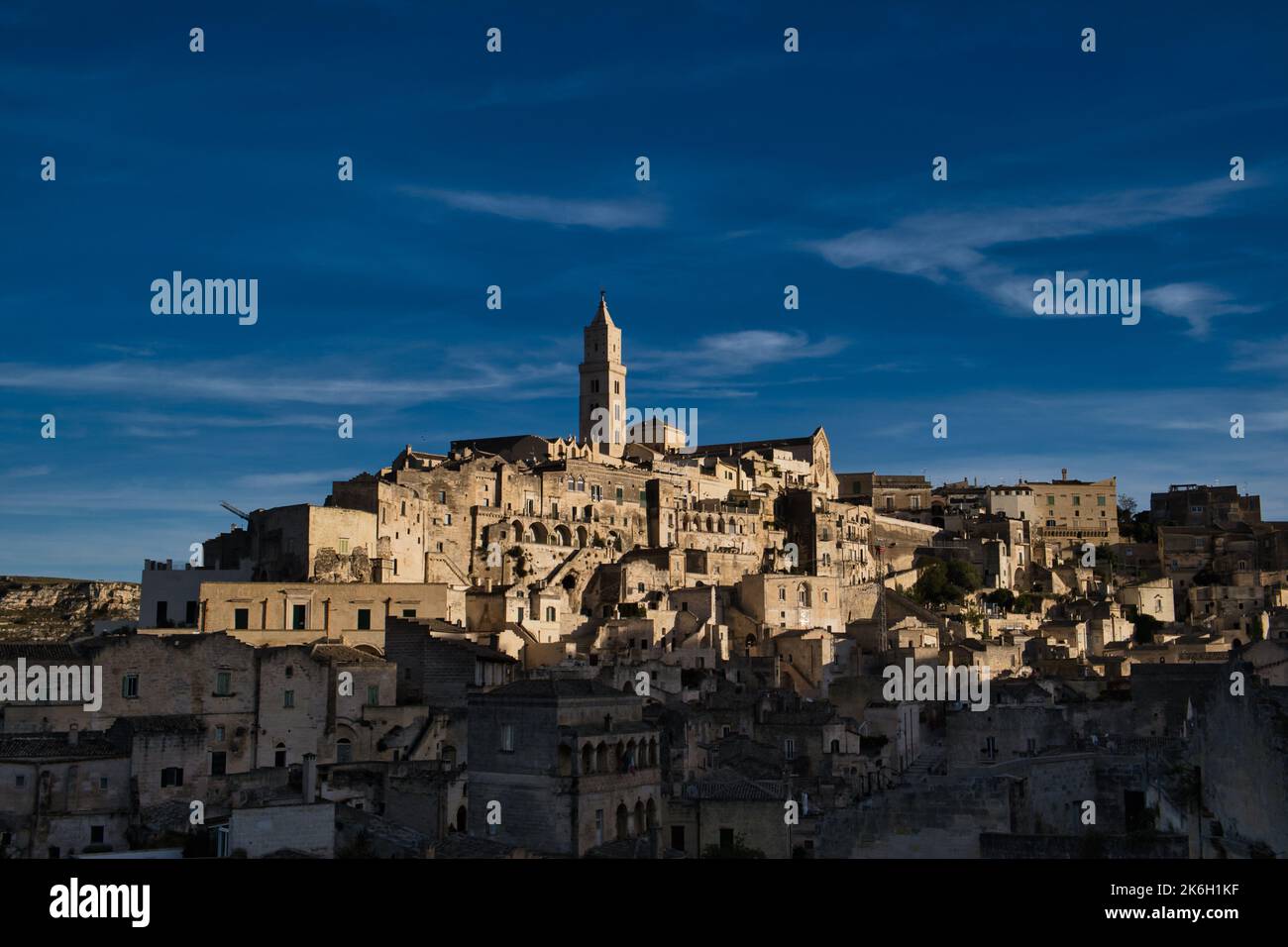 View of the Civita district in Matera with the characteristic bell tower Stock Photo