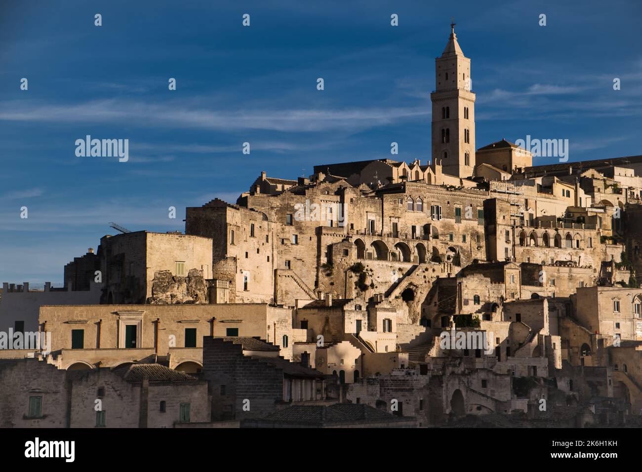 View of the Civita district in Matera with the characteristic bell tower Stock Photo