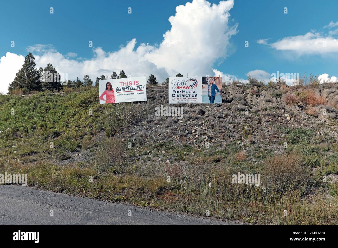 Political roadside billboards in Pagosa Springs, Colorado, promote Lauren Boebert and Shelli Shaw for the 2022 November elections. Stock Photo