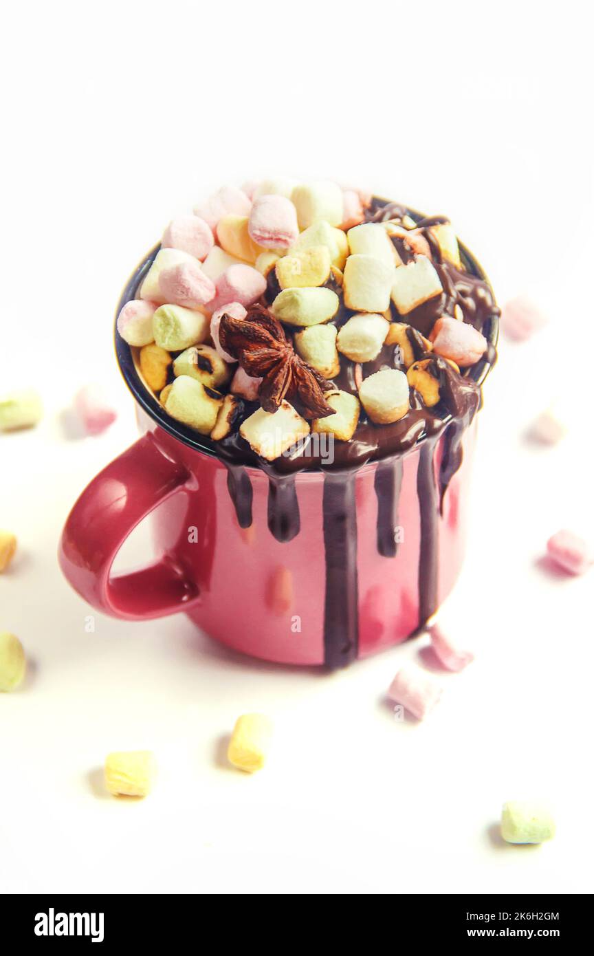 Hot chocolate and marshmallow on christmas background. Selective focus. Stock Photo